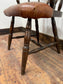 Vintage style spindle back chair with leather upholstery