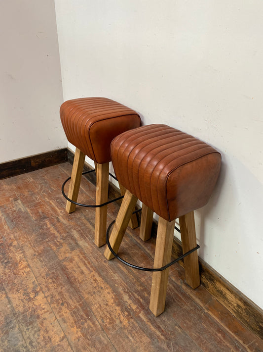 Pair of tan leather pommel stools