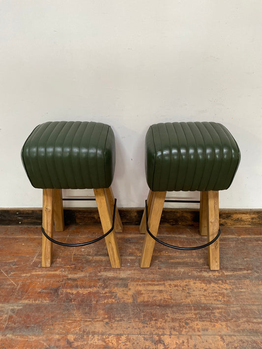 Pair of green leather pommel stools