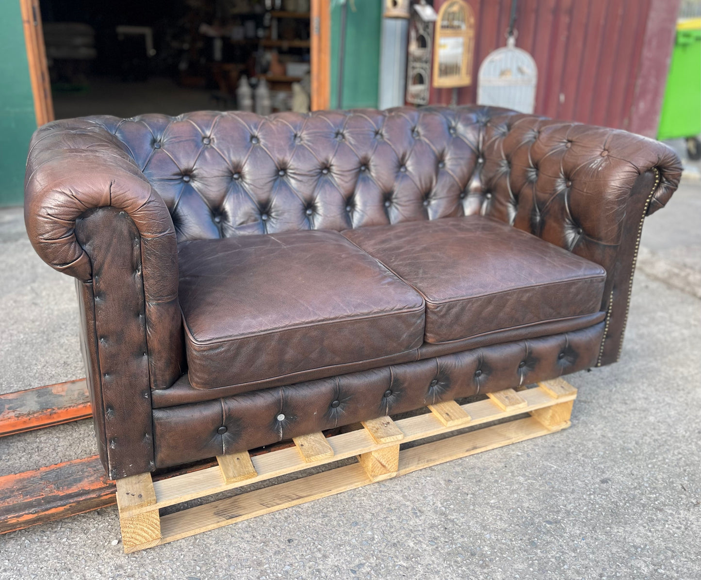 Brown leather 2 seater Chesterfield sofa