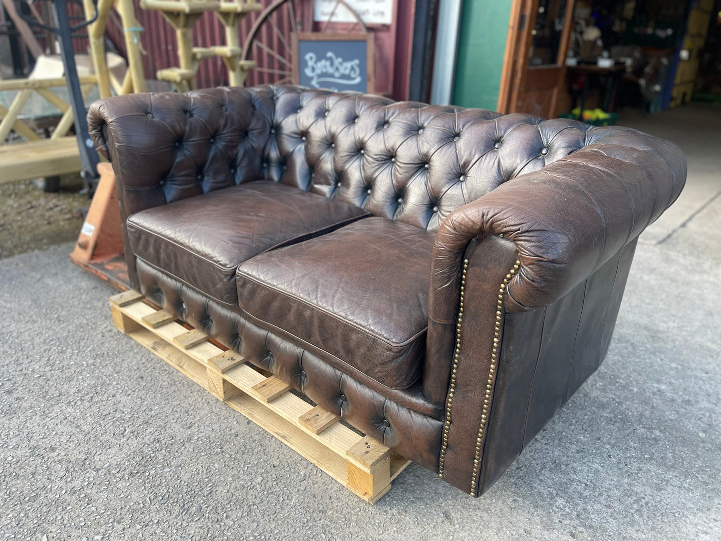 Brown leather 2 seater Chesterfield sofa
