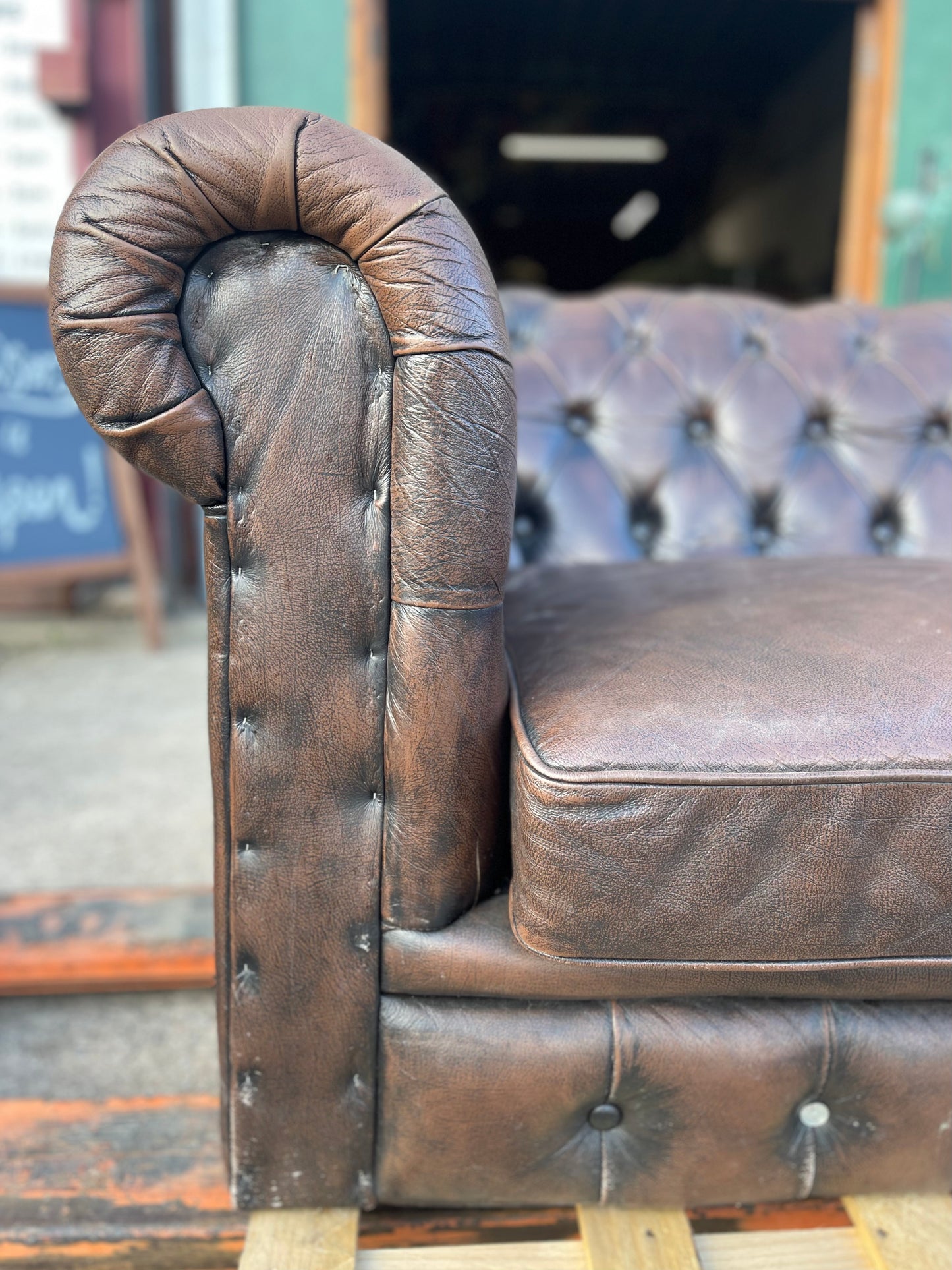 Brown leather 2 seater Chesterfield sofa