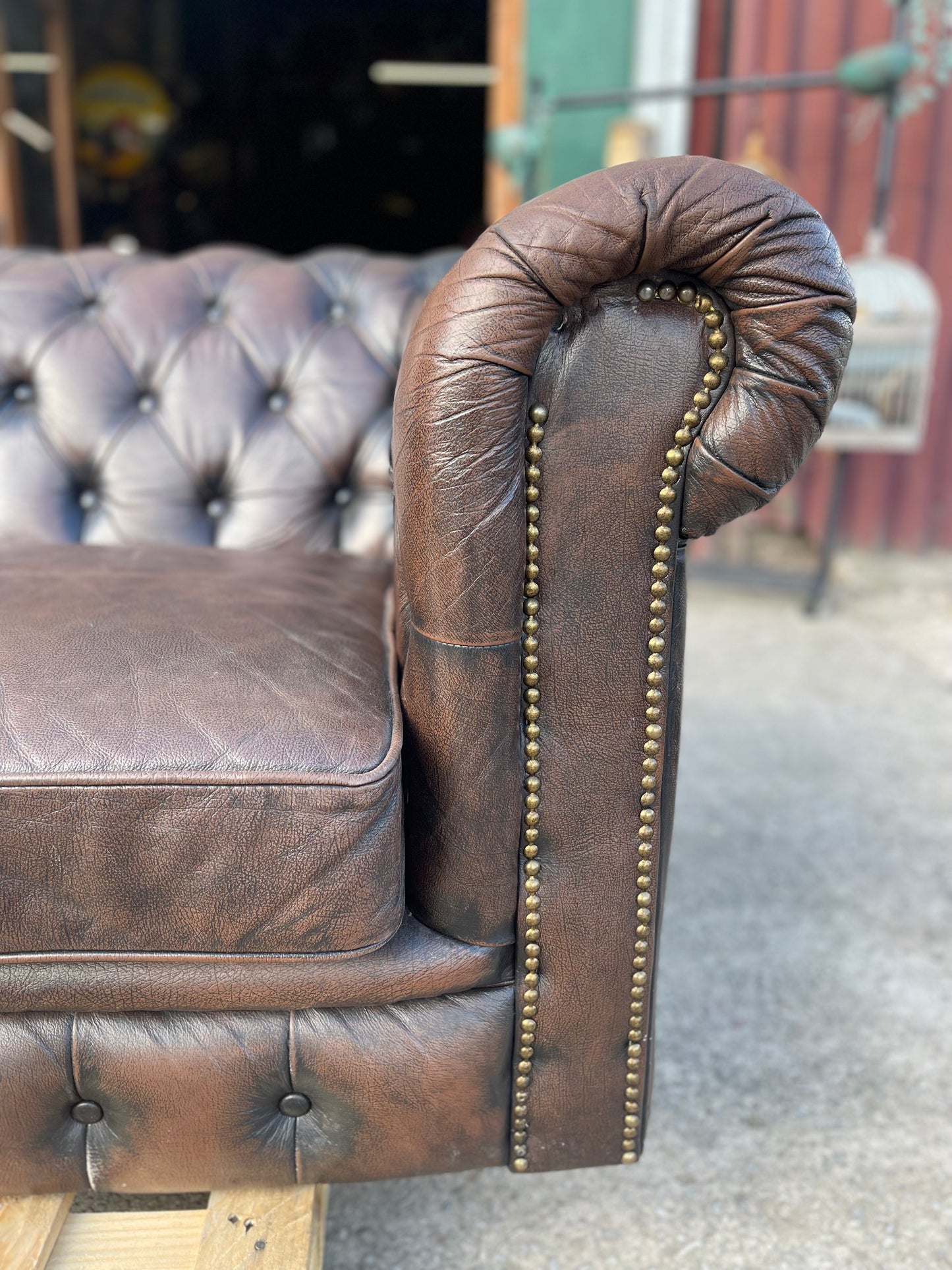 Brown leather 2 seater Chesterfield sofa