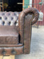 Brown leather 2 seater Chesterfield sofa