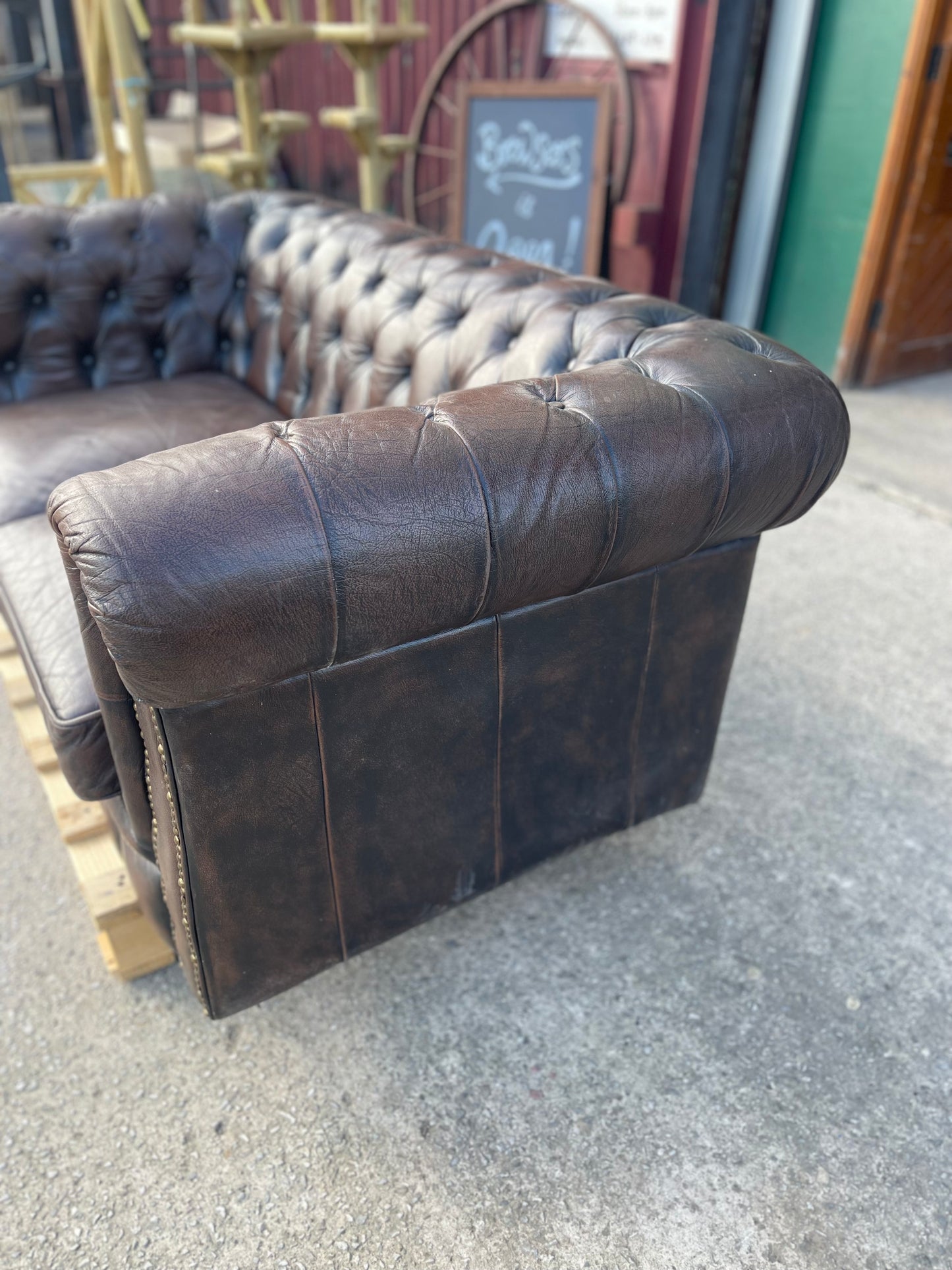 Brown leather 2 seater Chesterfield sofa