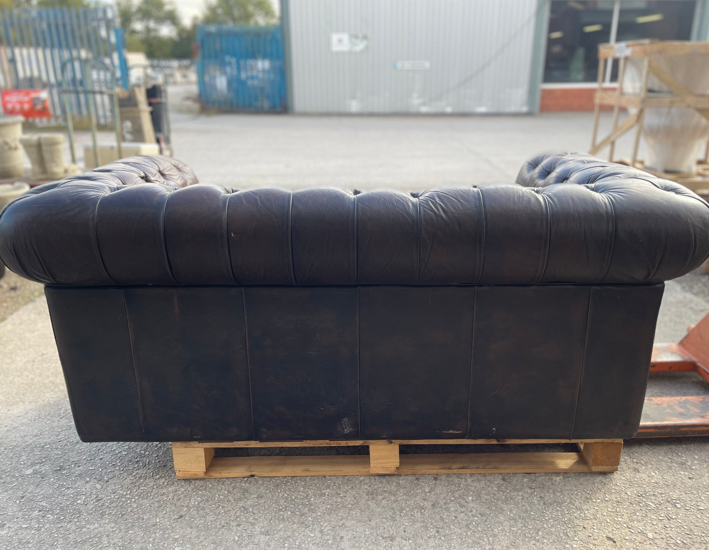 Brown leather 2 seater Chesterfield sofa