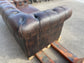 Brown leather 2 seater Chesterfield sofa