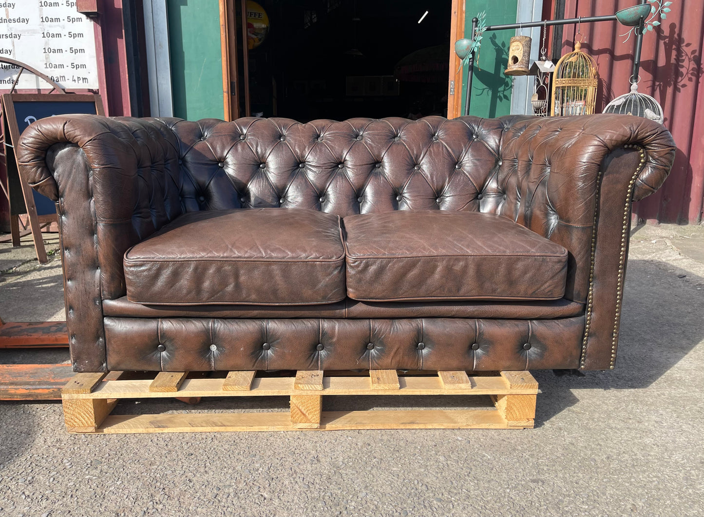 Brown leather 2 seater Chesterfield sofa