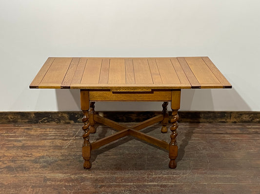 Antique 1920s draw-leaf extending table with barley twist legs