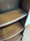 Narrow dark wood 1970s bookcase with dome top