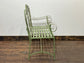 Ornate garden bench in green painted metal