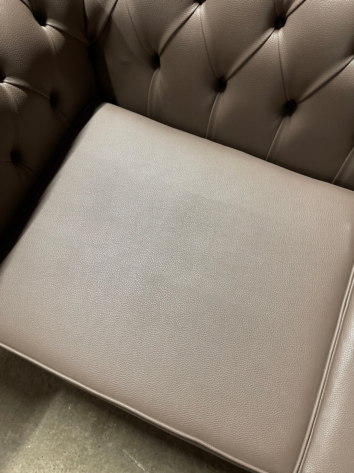 Grey Chesterfield sofa in faux-leather (ex-display)