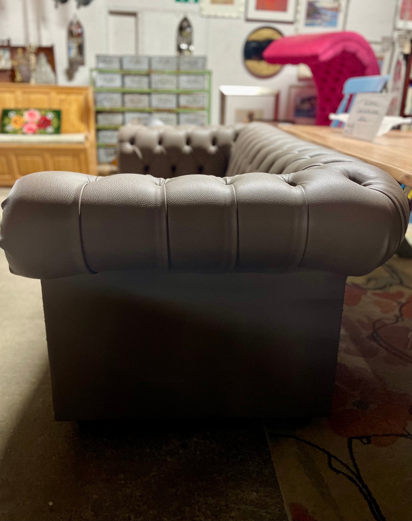 Grey Chesterfield sofa in faux-leather (ex-display)