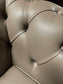Grey Chesterfield sofa in faux-leather (ex-display)