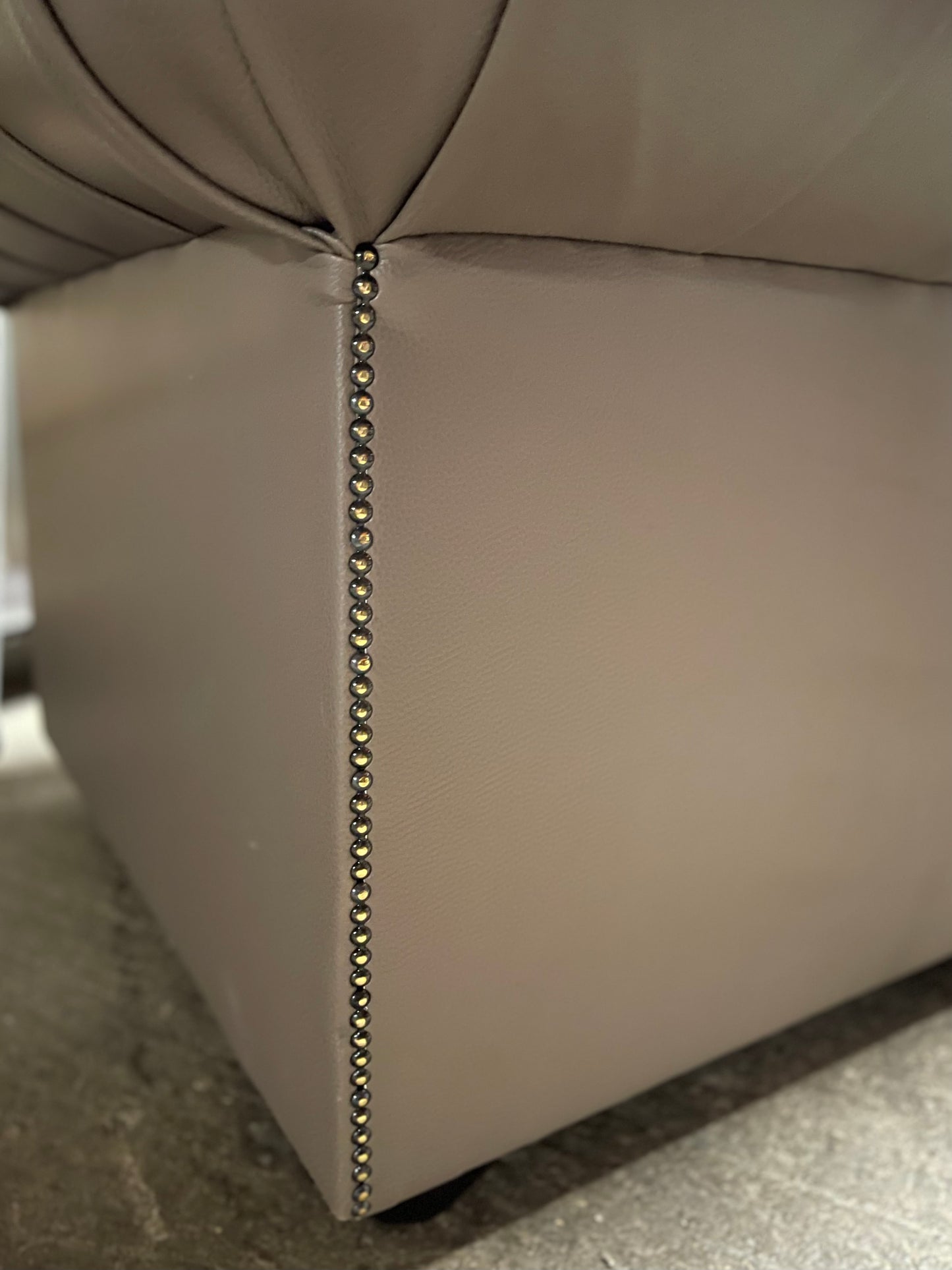 Grey Chesterfield sofa in faux-leather (ex-display)