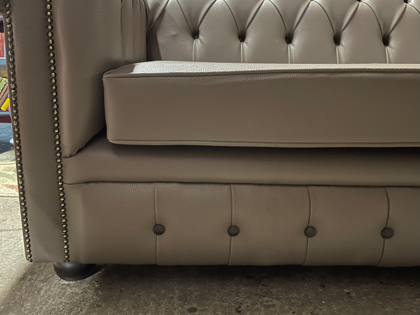 Grey Chesterfield sofa in faux-leather (ex-display)