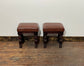 Pair of low pub stools in tan coloured faux-leather