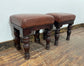 Pair of low pub stools in tan coloured faux-leather