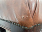 Pair of low pub stools in tan coloured faux-leather