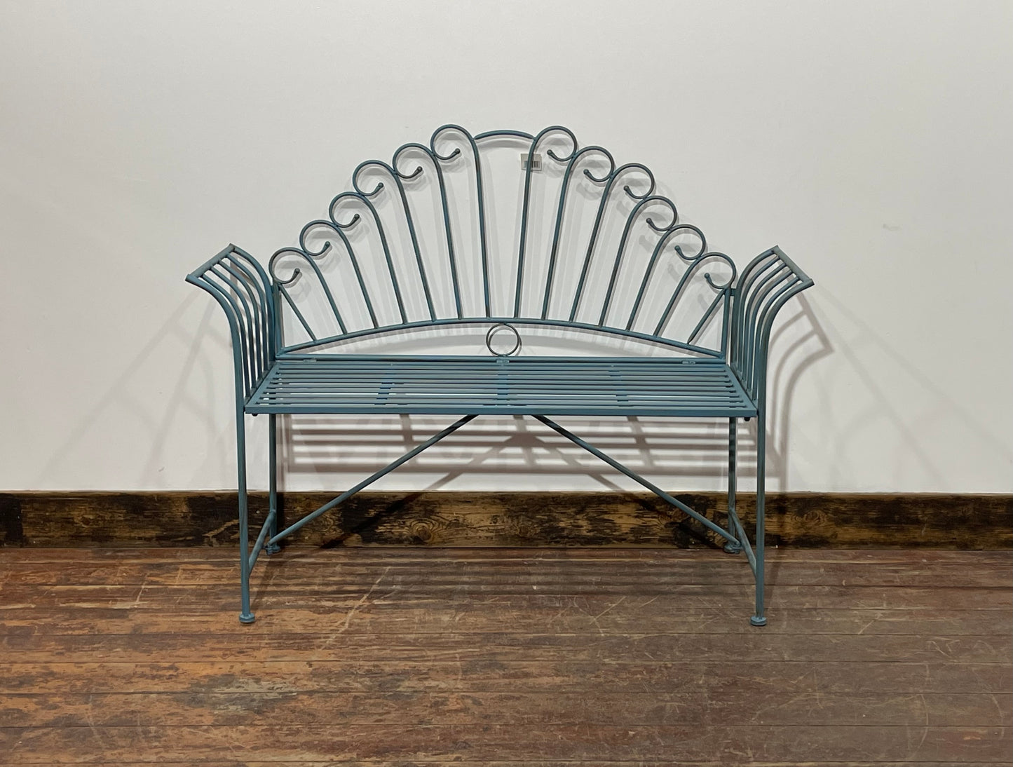 Pretty metal garden bench in light blue