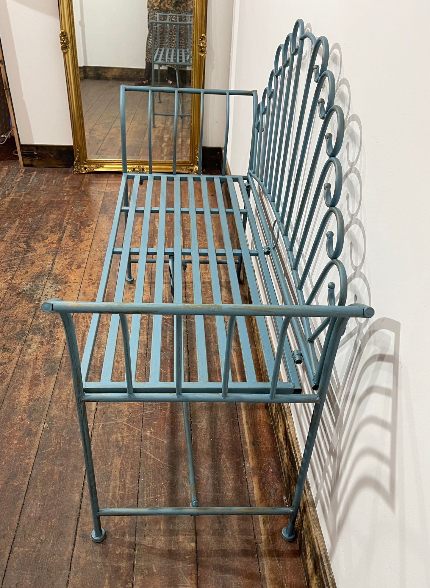 Pretty metal garden bench in light blue