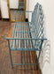 Pretty metal garden bench in light blue
