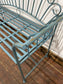 Pretty metal garden bench in light blue