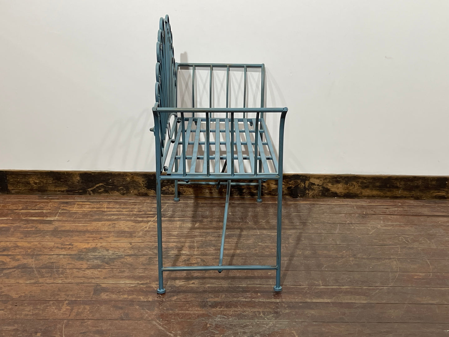 Pretty metal garden bench in light blue