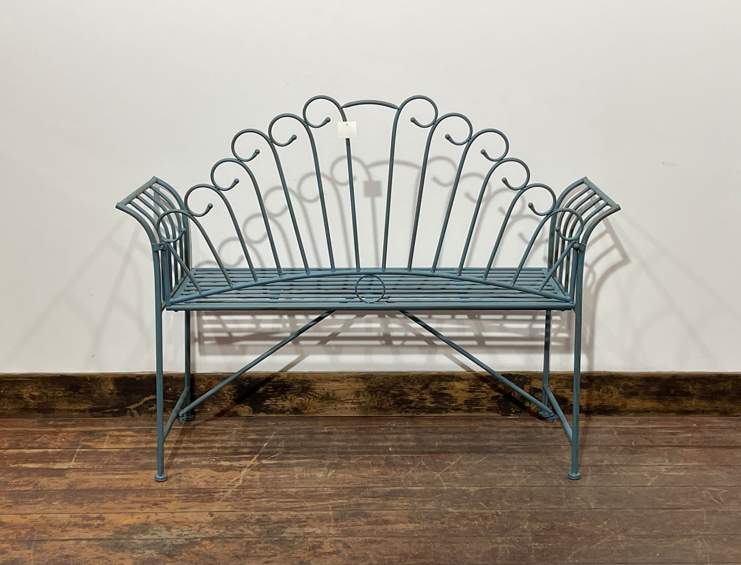 Pretty metal garden bench in light blue