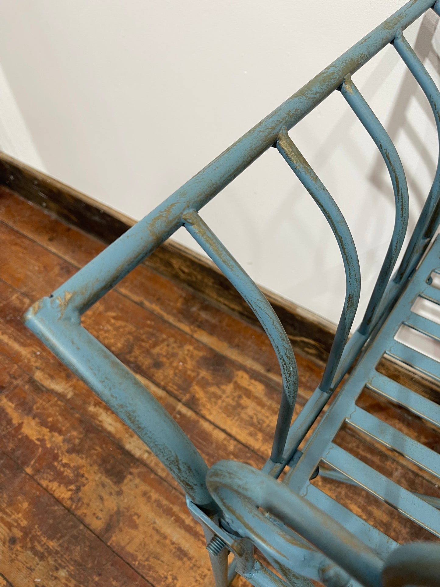 Pretty metal garden bench in light blue