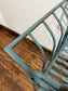 Pretty metal garden bench in light blue