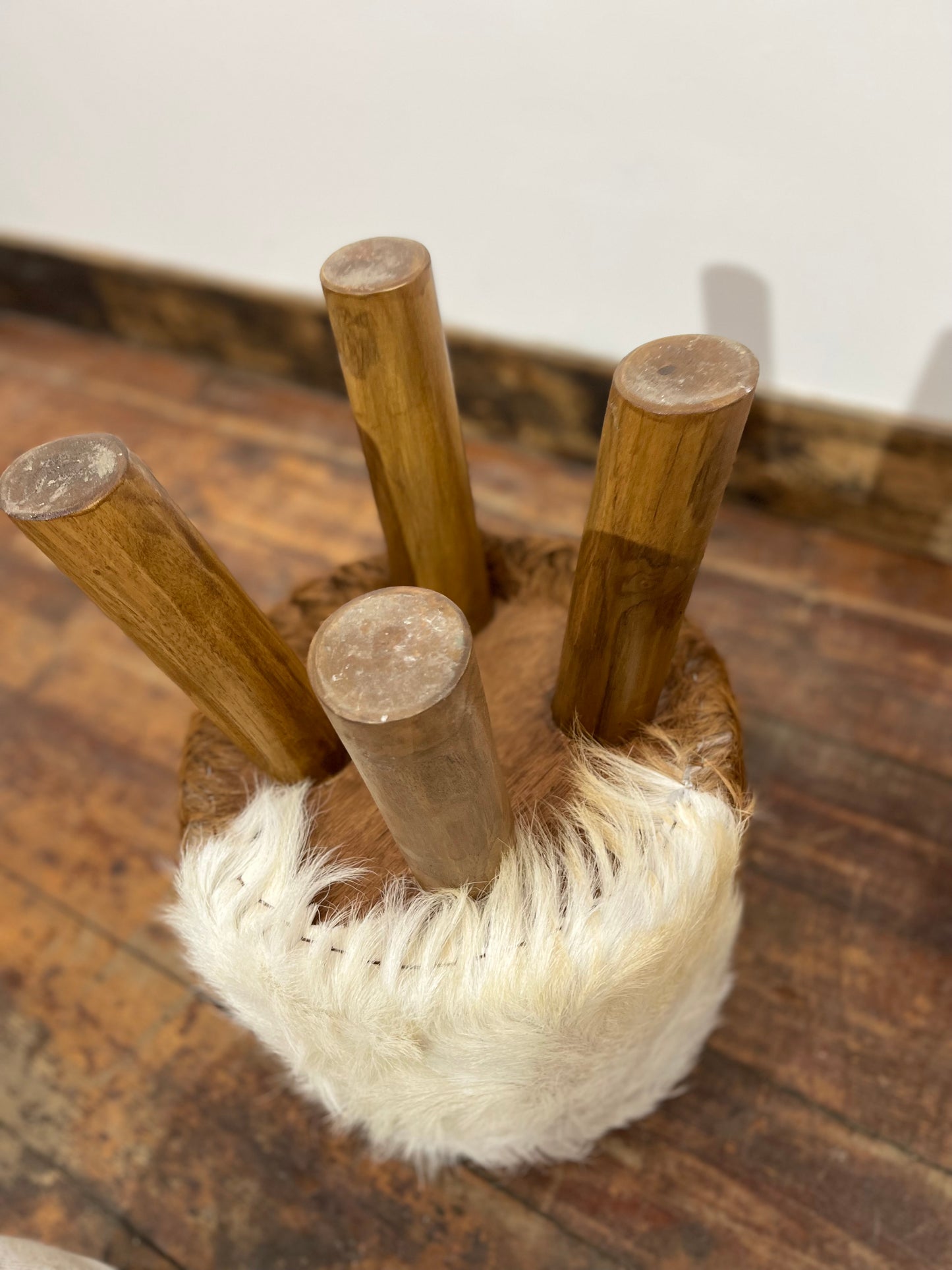 Pair of low cow hide stools