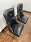 Pair of high back black studded chairs