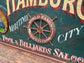 Vintage hand painted Hamburg ship's wheel / helm pub sign
