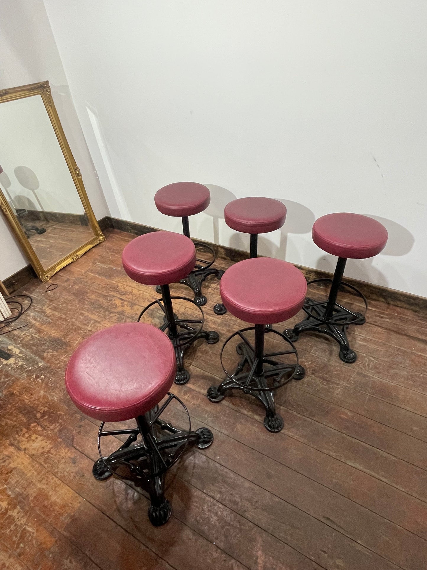 Set of 6 Industrial Cast Iron Bar Stools / Burgundy Padded Seats