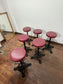 Set of 6 Industrial Cast Iron Bar Stools / Burgundy Padded Seats