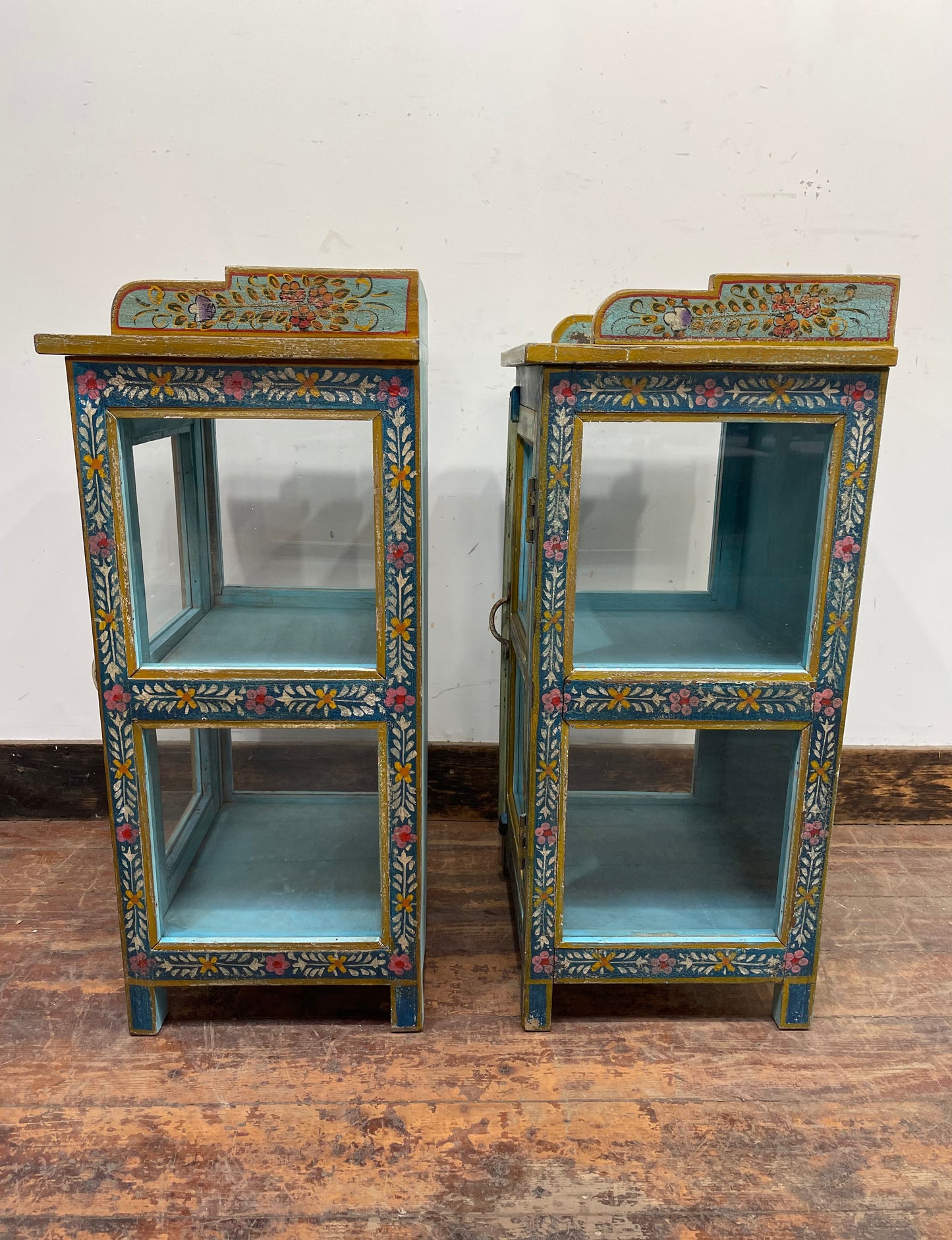 Pair of hand painted bedside tables / cabinets with glass panels