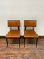 Retro style tan leather chairs