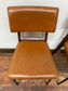 Retro style tan leather chairs