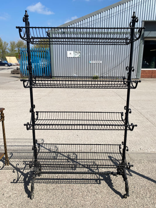 Black metal shelving rack on wheels