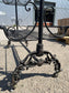 Black metal shelving rack on wheels