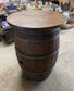 Barrel with round table top and 4 stools for pub / bar