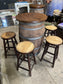 Barrel with round table top and 4 stools for pub / bar