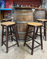 Barrel with round table top and 4 stools for pub / bar