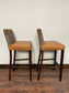 Pair of mustard yellow and patterned fabric bar stools