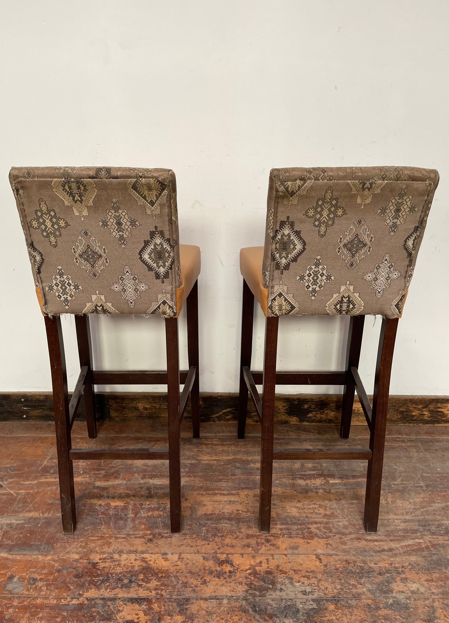 Pair of mustard yellow and patterned fabric bar stools