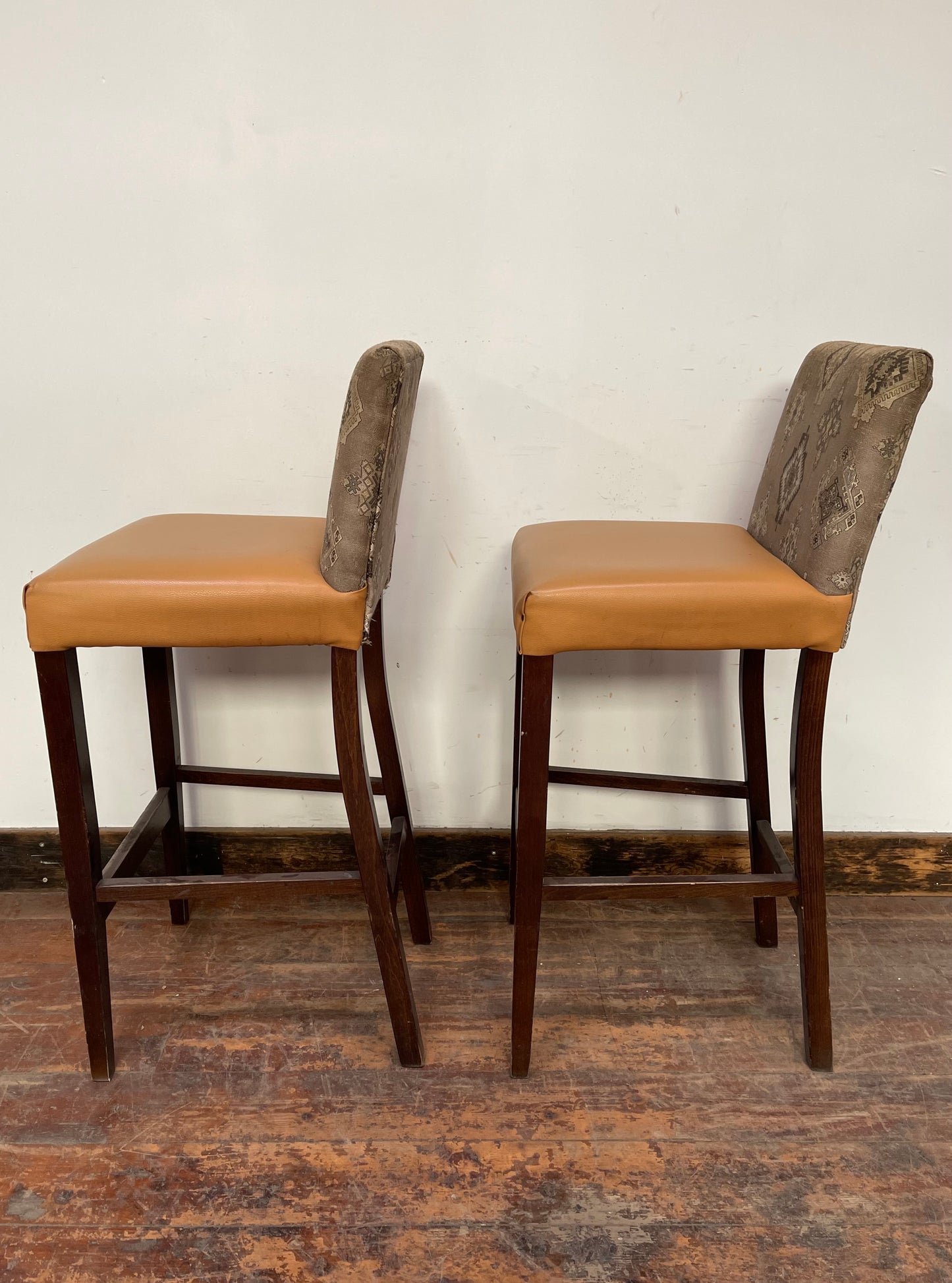 Pair of mustard yellow and patterned fabric bar stools