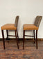 Pair of mustard yellow and patterned fabric bar stools
