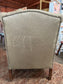 Grey Chesterfield style wingback armchair