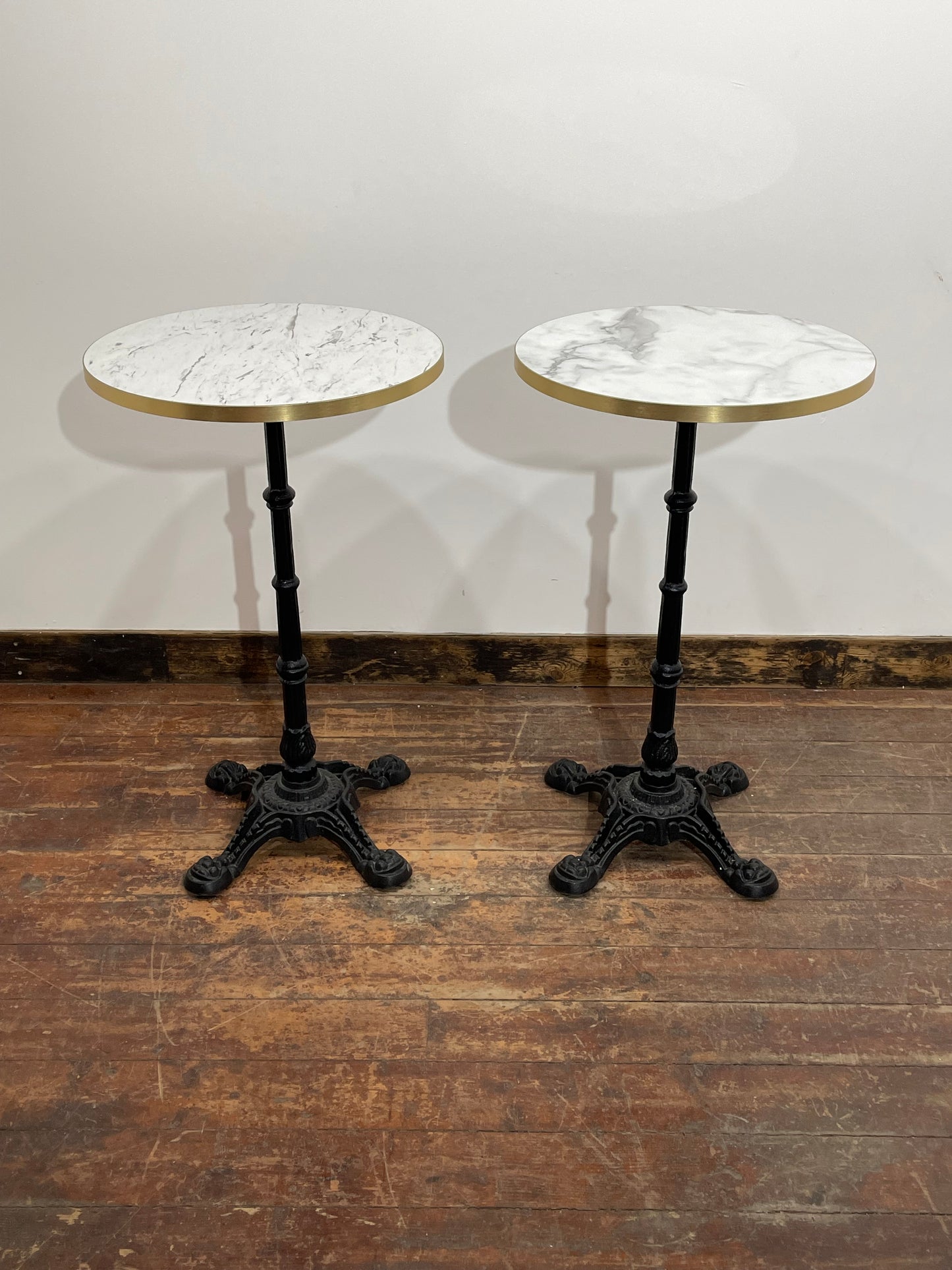 Pair of High Bar Poseur Tables Marble Effect Tops Gold Edge Cast Iron Bases